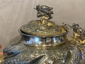 A Chinese four-piece silver tea set, Jiu Jiang Qing He Huan 九江 慶和 煥 mark, 19th C.