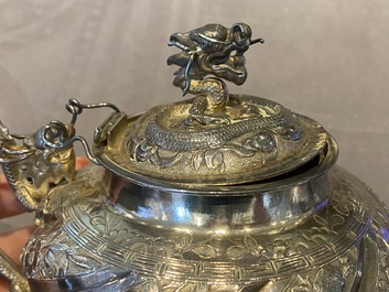 A Chinese four-piece silver tea set, Jiu Jiang Qing He Huan 九江 慶和 煥 mark, 19th C.