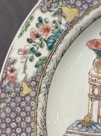 A pair of fine Chinese famille rose plates with a lady and two boys, Yongzheng