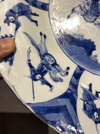 Three large deep Chinese blue and white 'hunting scene' dishes, Chenghua mark, Kangxi