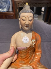 A Chinese famille rose figure of Buddha, Qianlong mark, 19/20th C.
