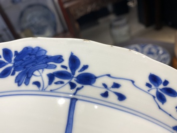 Three large deep Chinese blue and white 'hunting scene' dishes, Chenghua mark, Kangxi