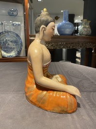 A Chinese famille rose figure of Buddha, Qianlong mark, 19/20th C.