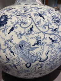 A large Chinese blue and white bottle vase, Qianlong mark, 19/20th C.