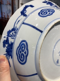 Three large deep Chinese blue and white 'hunting scene' dishes, Chenghua mark, Kangxi