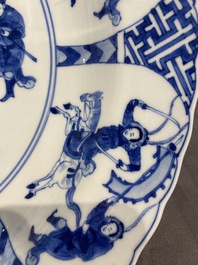 Three large deep Chinese blue and white 'hunting scene' dishes, Chenghua mark, Kangxi