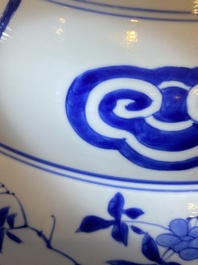 Three large deep Chinese blue and white 'hunting scene' dishes, Chenghua mark, Kangxi