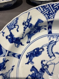 Three large deep Chinese blue and white 'hunting scene' dishes, Chenghua mark, Kangxi