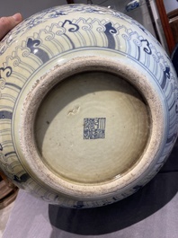 A large Chinese blue and white bottle vase, Qianlong mark, 19/20th C.