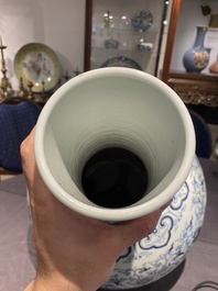 A large Chinese blue and white bottle vase, Qianlong mark, 19/20th C.