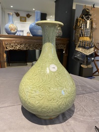 A Chinese Longquan celadon 'yuhuchunping' vase with floral design, Ming