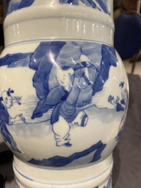 A Chinese blue and white 'gu' vase with figurative design, probably Kangxi