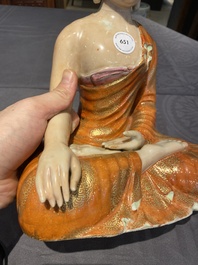 A Chinese famille rose figure of Buddha, Qianlong mark, 19/20th C.