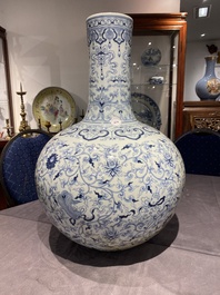 A large Chinese blue and white bottle vase, Qianlong mark, 19/20th C.