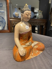 A Chinese famille rose figure of Buddha, Qianlong mark, 19/20th C.