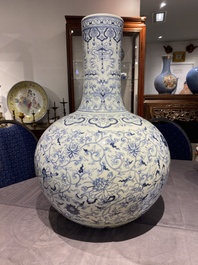 A large Chinese blue and white bottle vase, Qianlong mark, 19/20th C.
