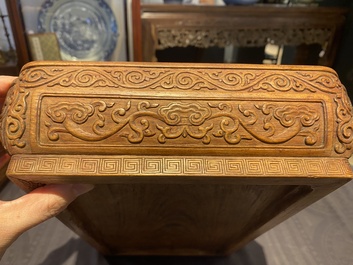 A Chinese rectangular huanghuali wooden box and cover with dragons, 17/18th C.