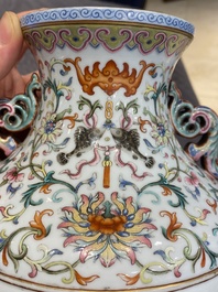 A Chinese famille rose 'hu' vase with fine landscapes, Qianlong mark, 19/20th C.