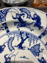 Three large deep Chinese blue and white 'hunting scene' dishes, Chenghua mark, Kangxi