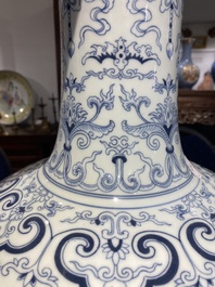 A large Chinese blue and white bottle vase, Qianlong mark, 19/20th C.