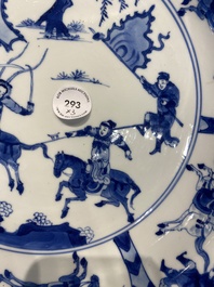 Three large deep Chinese blue and white 'hunting scene' dishes, Chenghua mark, Kangxi