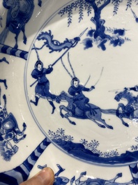 Three large deep Chinese blue and white 'hunting scene' dishes, Chenghua mark, Kangxi