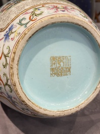 A Chinese famille rose 'hu' vase with fine landscapes, Qianlong mark, 19/20th C.