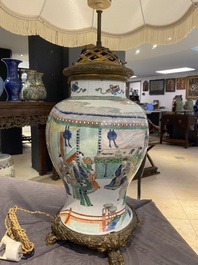 Un vase en porcelaine de Chine famille verte mont&eacute; en lampe, Kangxi