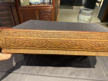 A Chinese rectangular huanghuali wooden box and cover with dragons, 17/18th C.