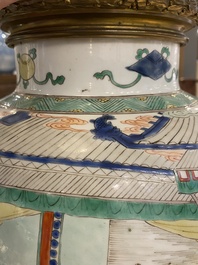 Un vase en porcelaine de Chine famille verte mont&eacute; en lampe, Kangxi