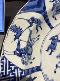 Three large deep Chinese blue and white 'hunting scene' dishes, Chenghua mark, Kangxi