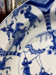 Three large deep Chinese blue and white 'hunting scene' dishes, Chenghua mark, Kangxi