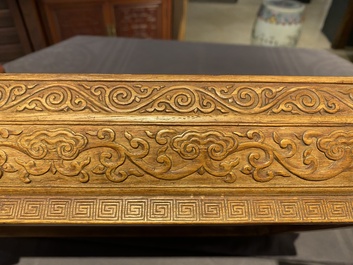 A Chinese rectangular huanghuali wooden box and cover with dragons, 17/18th C.