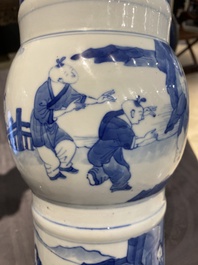 A Chinese blue and white 'gu' vase with figurative design, probably Kangxi