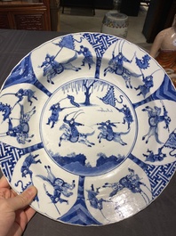 Three large deep Chinese blue and white 'hunting scene' dishes, Chenghua mark, Kangxi