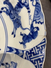 Three large deep Chinese blue and white 'hunting scene' dishes, Chenghua mark, Kangxi
