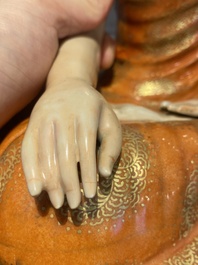 A Chinese famille rose figure of Buddha, Qianlong mark, 19/20th C.