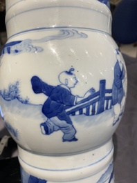A Chinese blue and white 'gu' vase with figurative design, probably Kangxi