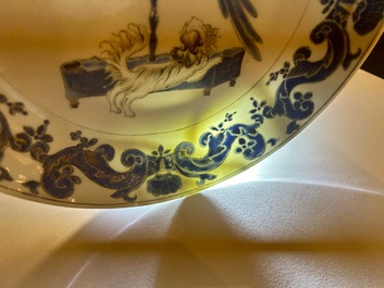 A pair of Chinese eggshell Pronk studio 'parrot and spaniel' plates, Yongzheng/Qianlong