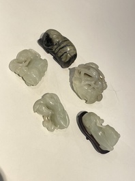 Five Chinese white, celadon and grey-black jade carvings, Qing/Republic