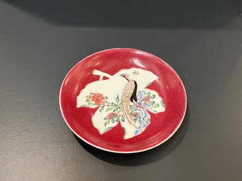 A Chinese famille rose ruby-pink-ground 'pheasants' cup and saucer, Yongzheng