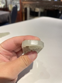 Three Chinese celadon and white jade pendants, Qing