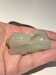 Five Chinese white, celadon and grey-black jade carvings, Qing/Republic