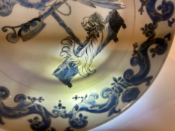 A pair of Chinese eggshell Pronk studio 'parrot and spaniel' plates, Yongzheng/Qianlong