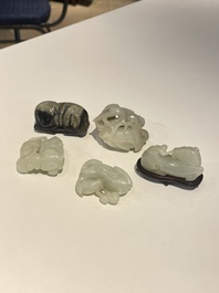 Five Chinese white, celadon and grey-black jade carvings, Qing/Republic