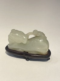 Five Chinese white, celadon and grey-black jade carvings, Qing/Republic