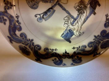 A pair of Chinese eggshell Pronk studio 'parrot and spaniel' plates, Yongzheng/Qianlong