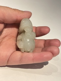Five Chinese white, celadon and grey-black jade carvings, Qing/Republic