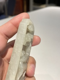 Three Chinese celadon and white jade pendants, Qing