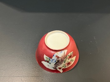A Chinese famille rose ruby-pink-ground 'pheasants' cup and saucer, Yongzheng